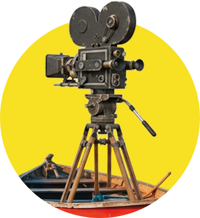 Vintage film camera on a tripod in a wooden boat, against a yellow circle